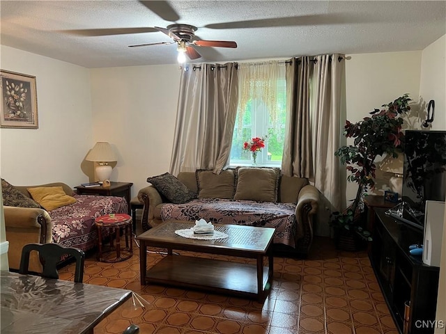4067 Taylor Rd, Pompey, NY 13078 - living area featuring ceiling fan, tile patterned floors, and a textured ceiling