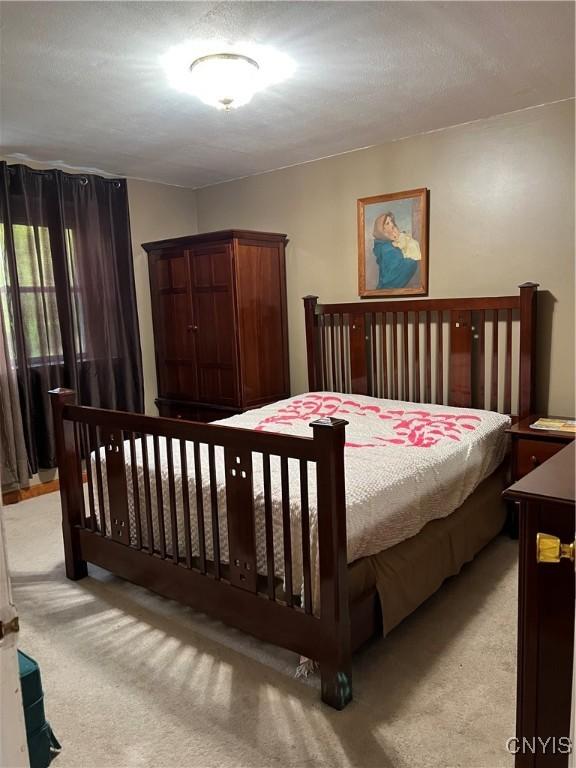 4067 Taylor Rd, Pompey, NY 13078 - bedroom with light carpet