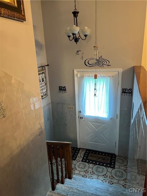 4067 Taylor Rd, Pompey, NY 13078 - entryway featuring tile walls and wainscoting