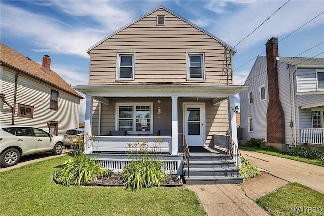2910 Weston Ave, Niagara Falls, NY 14305 - traditional style home with covered porch and a front lawn