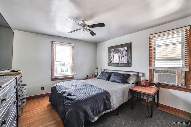 2910 Weston Ave, Niagara Falls, NY 14305 - bedroom featuring cooling unit, a ceiling fan, and light wood-style floors