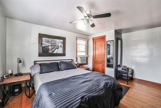 2910 Weston Ave, Niagara Falls, NY 14305 - bedroom with wood finished floors, cooling unit, and ceiling fan