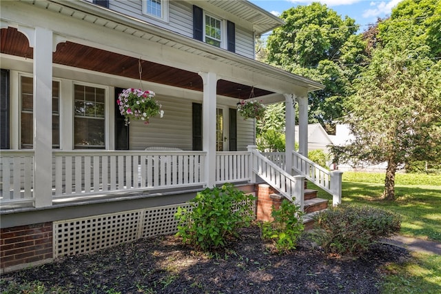 234 Pine Grove Ave, Irondequoit, NY 14617 - doorway to property with a porch