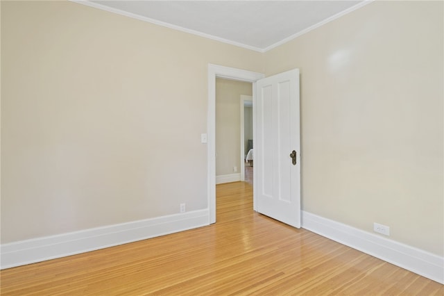 234 Pine Grove Ave, Irondequoit, NY 14617 - empty room featuring light wood-style floors and crown molding