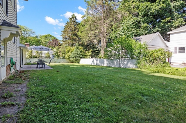 234 Pine Grove Ave, Irondequoit, NY 14617 - view of yard with a patio area