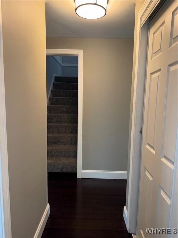149 Wrexham Ct S, Tonawanda, NY 14150 - hall with dark wood finished floors and stairs