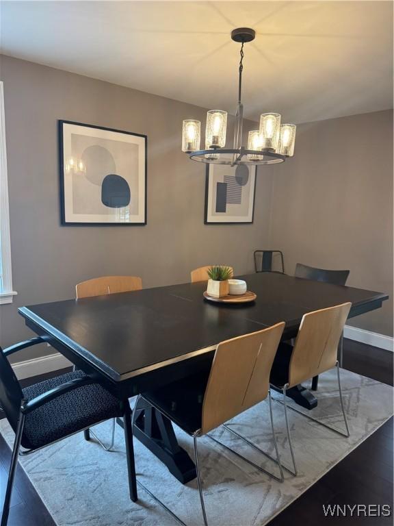 149 Wrexham Ct S, Tonawanda, NY 14150 - dining space with a chandelier and wood finished floors