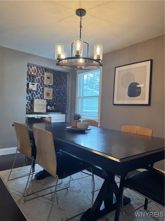 149 Wrexham Ct S, Tonawanda, NY 14150 - dining area with a chandelier and baseboards