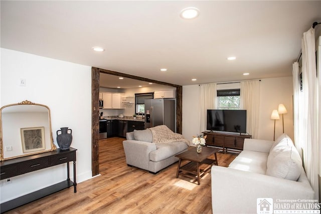 6064 Nys Rte 242 E, Ellicottville, NY 14731 - living area with light wood finished floors and recessed lighting