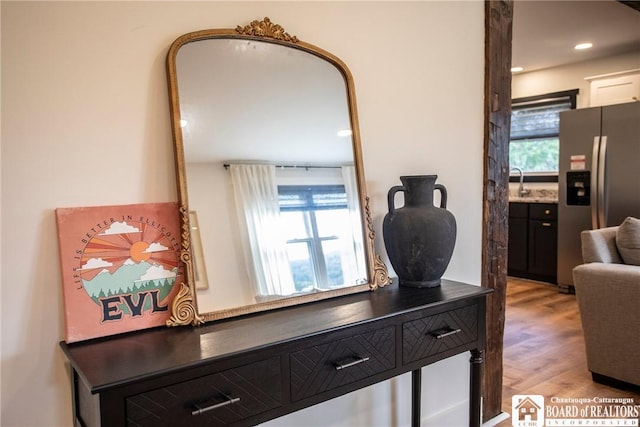 6064 Nys Rte 242 E, Ellicottville, NY 14731 - detailed view of stainless steel fridge, wood finished floors, and recessed lighting