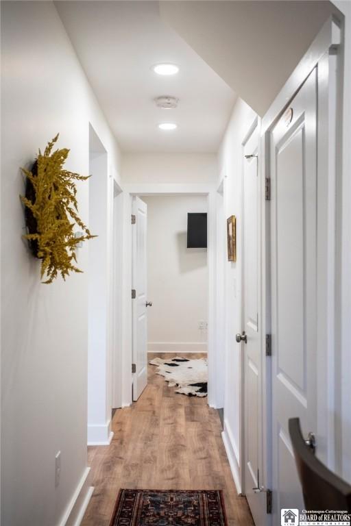 6064 Nys Rte 242 E, Ellicottville, NY 14731 - hall featuring wood finished floors and recessed lighting
