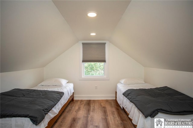 6064 Nys Rte 242 E, Ellicottville, NY 14731 - bedroom featuring wood finished floors, lofted ceiling, and recessed lighting