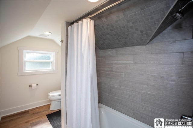 6064 Nys Rte 242 E, Ellicottville, NY 14731 - bathroom featuring lofted ceiling, wood finished floors, and shower / bath combo with shower curtain