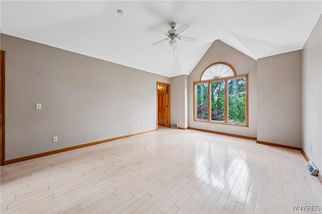 100 Hunt Club Cir, Amherst, NY 14051 - empty room with a ceiling fan, light wood-style flooring, vaulted ceiling, and a smoke detector