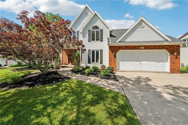 100 Hunt Club Cir, Amherst, NY 14051 - traditional home featuring driveway, a front yard, and brick siding