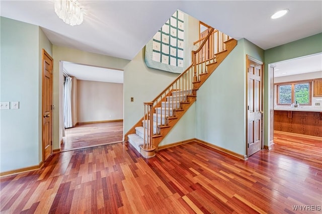 100 Hunt Club Cir, Amherst, NY 14051 - stairs featuring wood finished floors and recessed lighting