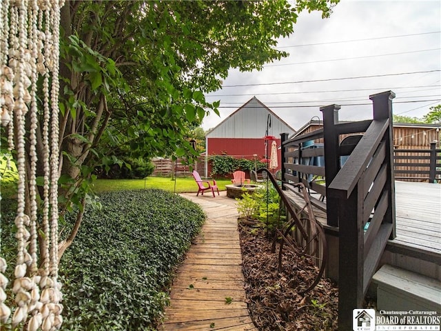 6295 Stockton Hartfield Rd, Chautauqua, NY 14728 - deck with an outdoor fire pit