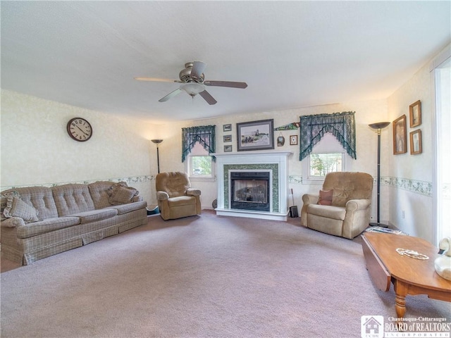 6295 Stockton Hartfield Rd, Chautauqua, NY 14728 - living room with healthy amount of natural light, a fireplace with raised hearth, carpet, and ceiling fan