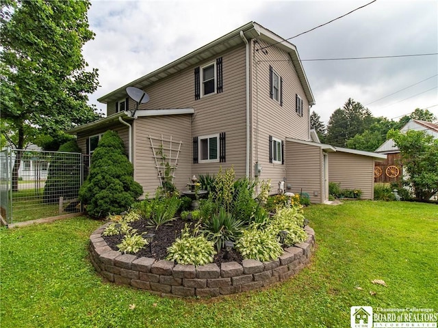 6295 Stockton Hartfield Rd, Chautauqua, NY 14728 - view of property exterior featuring a yard