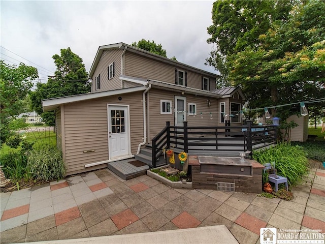 6295 Stockton Hartfield Rd, Chautauqua, NY 14728 - rear view of property with a patio and a deck