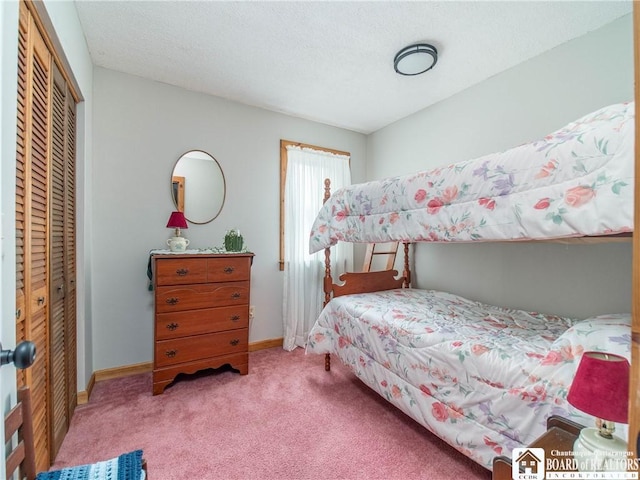 6295 Stockton Hartfield Rd, Chautauqua, NY 14728 - carpeted bedroom featuring a closet and a textured ceiling