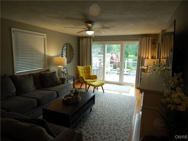 9715 Ethel Rd, Clay, NY 13029 - living area featuring wood finished floors and a ceiling fan