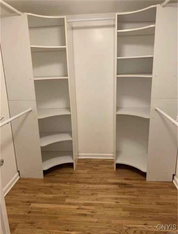 9715 Ethel Rd, Clay, NY 13029 - spacious closet featuring wood finished floors