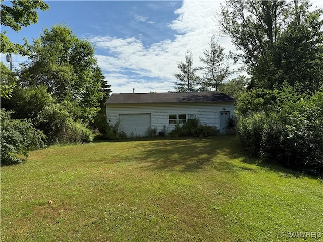 3902 Calkins Rd, Porter, NY 14174 - view of grassy yard featuring an attached garage