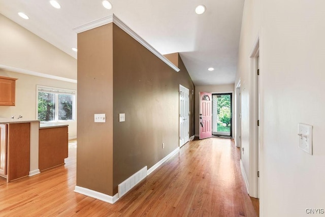 42 Nursery Ln, Syracuse, NY 13210 - hallway with healthy amount of natural light, lofted ceiling, light wood-style floors, and recessed lighting