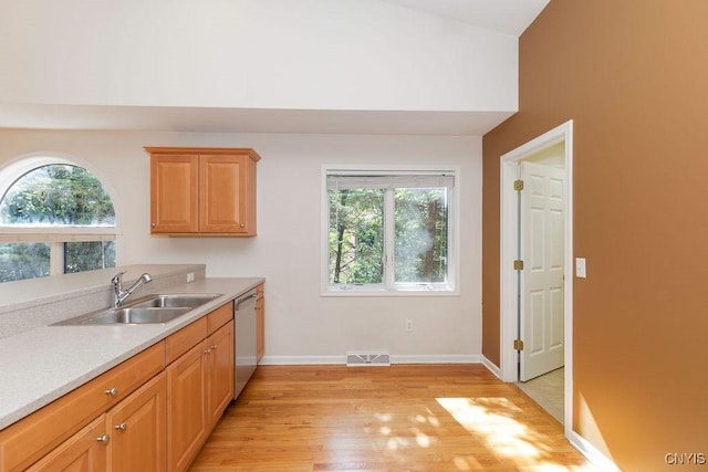 42 Nursery Ln, Syracuse, NY 13210 - kitchen with dishwasher, light wood-style flooring, and light countertops