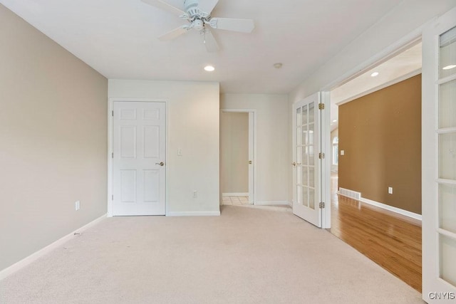 42 Nursery Ln, Syracuse, NY 13210 - unfurnished bedroom featuring french doors, recessed lighting, a ceiling fan, and light colored carpet