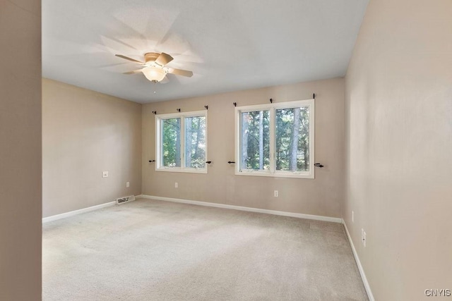 42 Nursery Ln, Syracuse, NY 13210 - empty room featuring a ceiling fan and light carpet