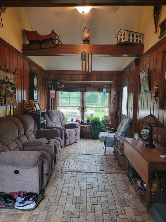 244 State Highway 320, Norwich, NY 13815 - living room with wood walls, brick patterned floors, and beamed ceiling