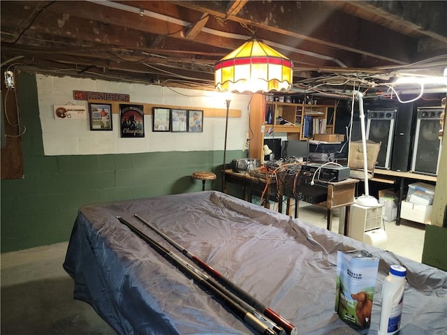 244 State Highway 320, Norwich, NY 13815 - bedroom with concrete block wall, concrete floors, and billiards