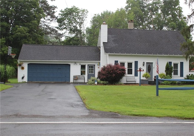 244 State Highway 320, Norwich, NY 13815 - new england style home featuring a garage, a chimney, a front yard, and asphalt driveway