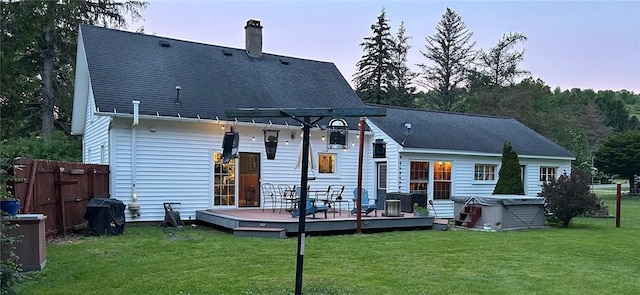 244 State Highway 320, Norwich, NY 13815 - back of property with a wooden deck, a chimney, and a hot tub