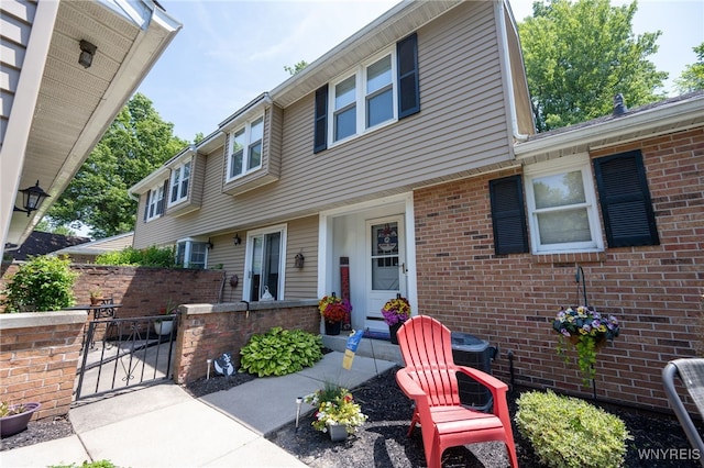 253 Old Oak Post Rd, Amherst, NY 14051 - view of front of house featuring a gate and brick siding