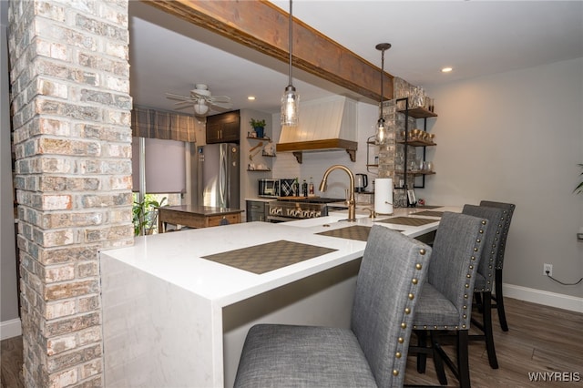 253 Old Oak Post Rd, Amherst, NY 14051 - kitchen featuring freestanding refrigerator, open shelves, a ceiling fan, wood finished floors, and a peninsula