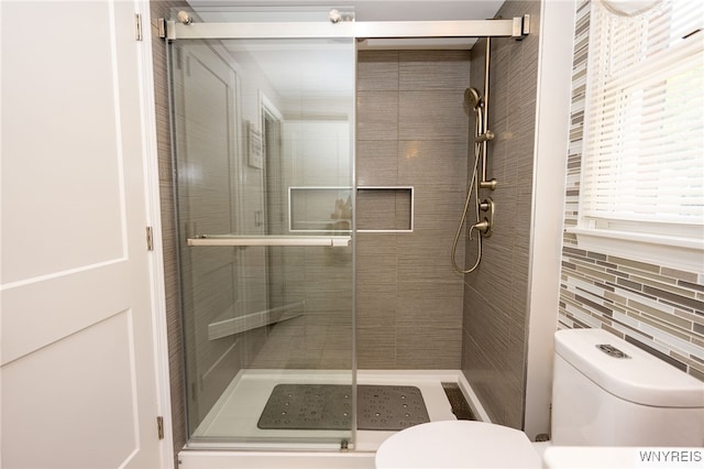 253 Old Oak Post Rd, Amherst, NY 14051 - bathroom featuring a shower stall and tile walls