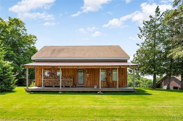 1307 Sawmill Rd, Sangerfield, NY 13480 - rear view of house featuring a porch and a lawn