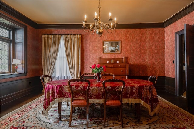 407 W Church St, Elmira City, NY 14901 - dining area with ornamental molding, a chandelier, wood finished floors, and a wainscoted wall