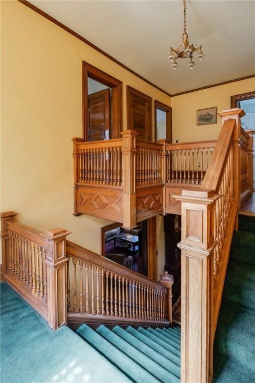 407 W Church St, Elmira City, NY 14901 - stairs featuring carpet floors, a chandelier, and crown molding
