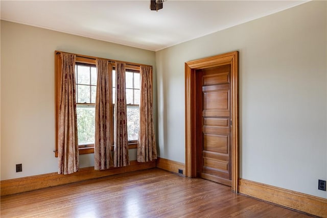 407 W Church St, Elmira City, NY 14901 - unfurnished room featuring wood finished floors and baseboards
