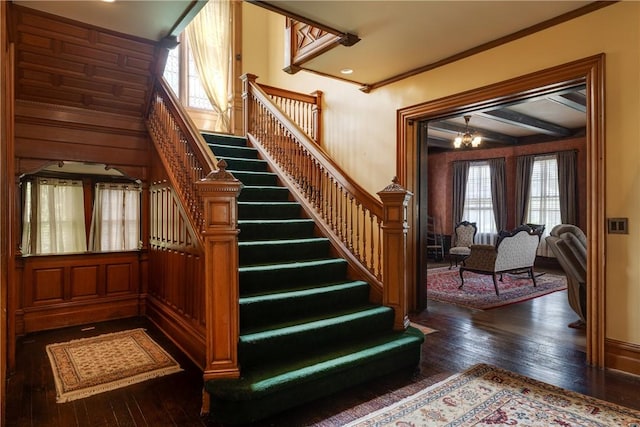 407 W Church St, Elmira City, NY 14901 - stairway featuring wood-type flooring, a chandelier, and crown molding