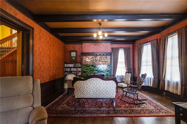 407 W Church St, Elmira City, NY 14901 - living area featuring stairs, wood finished floors, plenty of natural light, beamed ceiling, and a chandelier