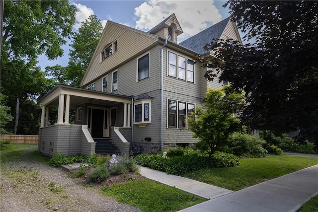 407 W Church St, Elmira City, NY 14901 - view of front facade with a front lawn and covered porch