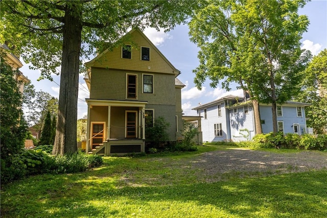 407 W Church St, Elmira City, NY 14901 - rear view of property with a porch and a lawn