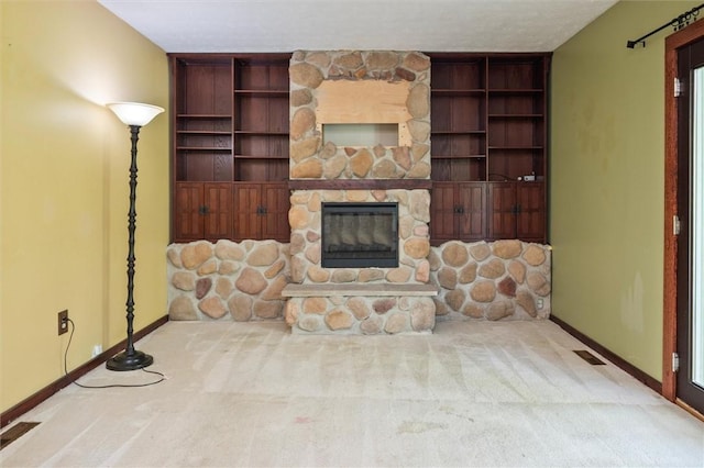 53 Alecia Dr, Greece, NY 14626 - carpeted living room featuring baseboards and a stone fireplace