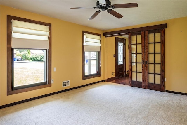 53 Alecia Dr, Greece, NY 14626 - unfurnished room with french doors, carpet flooring, and ceiling fan