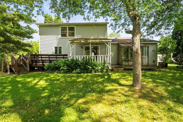 53 Alecia Dr, Greece, NY 14626 - back of property with a lawn and a wooden deck